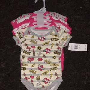 New 3 month Betsey Johnson 5 piece onesie set.